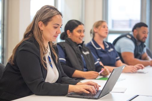 Case managers meeting with other Corrections staff